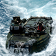 Image for article titled Watch This Amphibious Assault Vehicle Leap Off A Pier Into The Water At High Speed